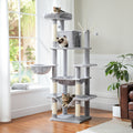 Light grey Mid-Rise cat tree with tabby on the top perch, pointed cat at condo and another tabby in the lower sling