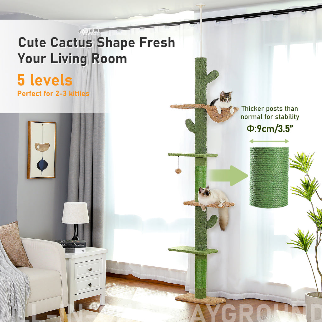 Green cactus cat tree with five levels in a bright living room, tabby cat curled in the tan basket hammock near the top