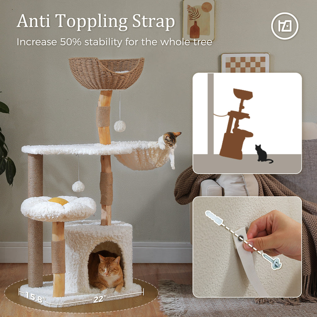 Close-up of a hand fastening the anti-toppling strap to the wall beside the wood cat tree with cats