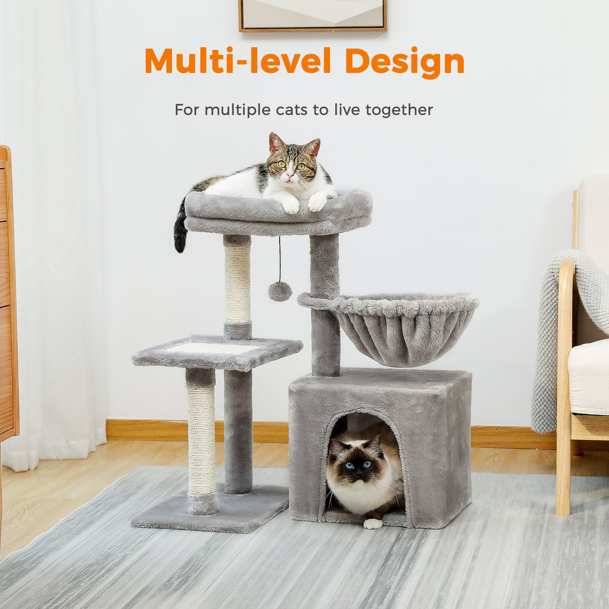 Grey 73cm cat tree in a living room, tabby on the top perch and Siamese in the condo, caption Multi-level Design