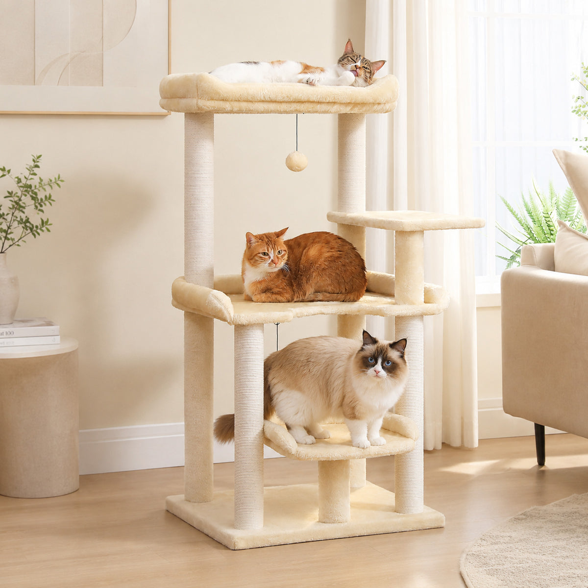 Cream 110cm cat tree in a modern living room, calico cat in the top bed and ragdoll cat on a lower perch