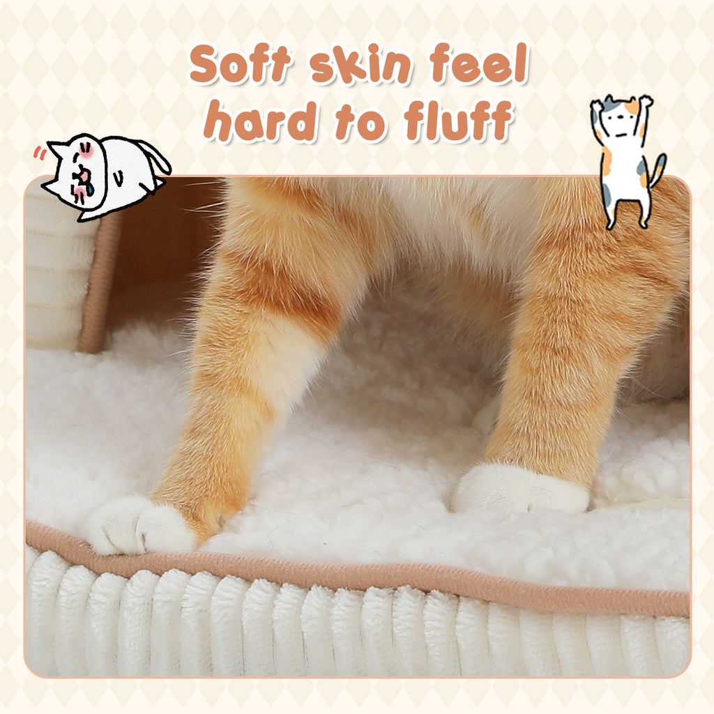 Ginger and white cat standing on the thick white sherpa cushion of a corduroy cave bed in a close-up texture view