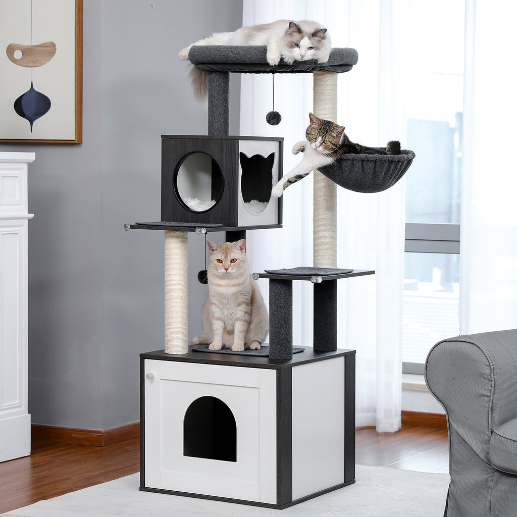 Black and white Deluxe cat tree with charcoal plush pads and sisal posts, three cats relaxing in a sunlit living room