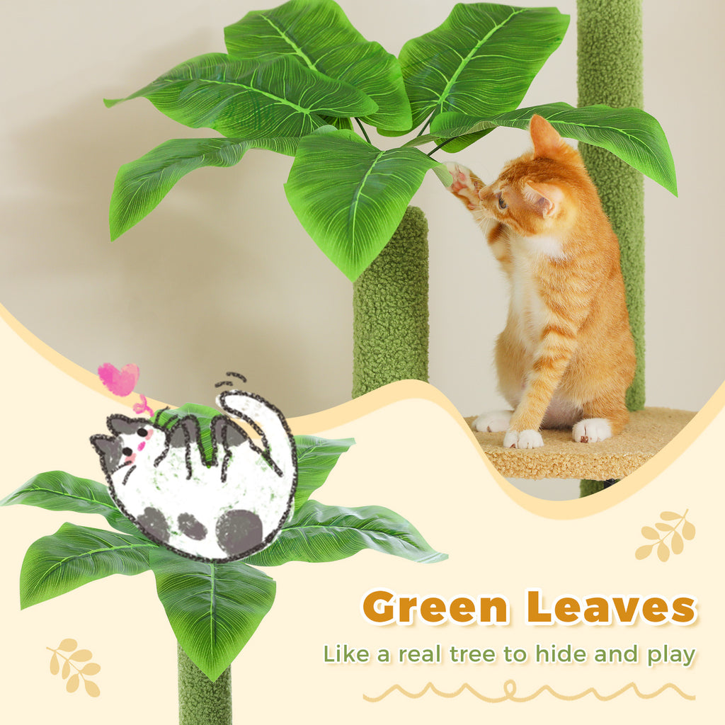 Ginger kitten bats artificial green leaves crowning a Sky-High cat tree post under a Green Leaves hide and play caption