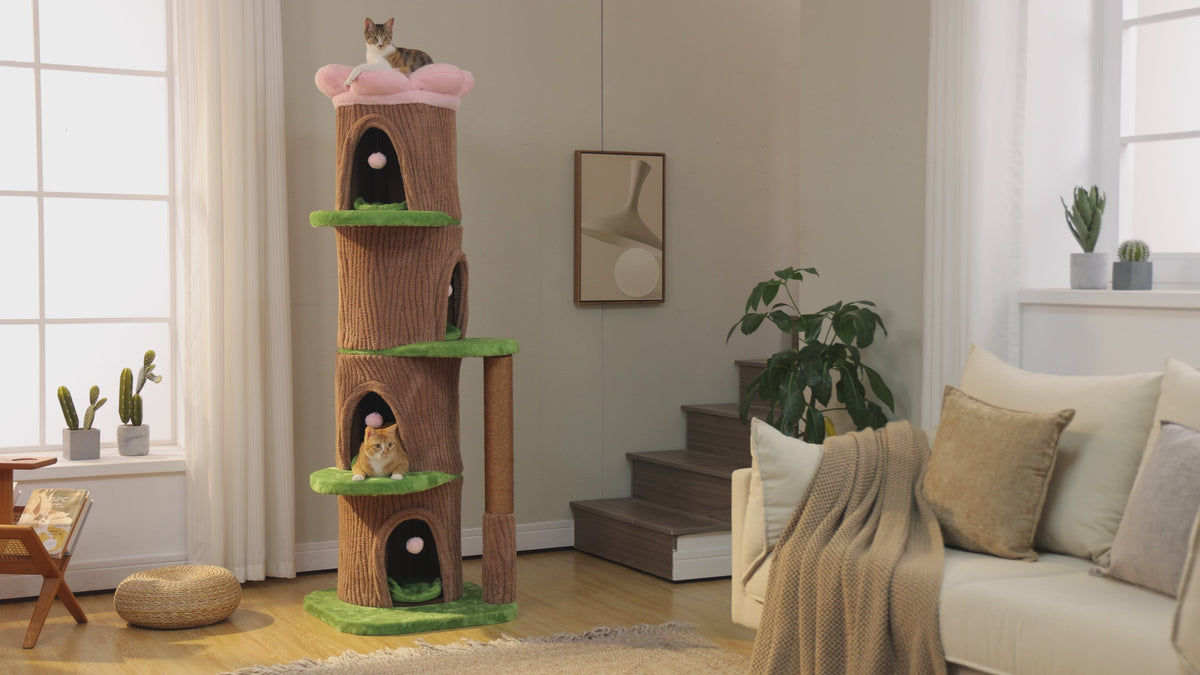 Brown bark cat tower with green platforms and pink flower top perch, calico cat lounging in the flower bed